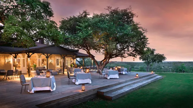 Luxury safari lodge deck at sunset